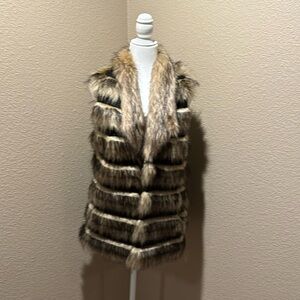 Faux-fur vest prefect for a day at the office or evening out on the town!
